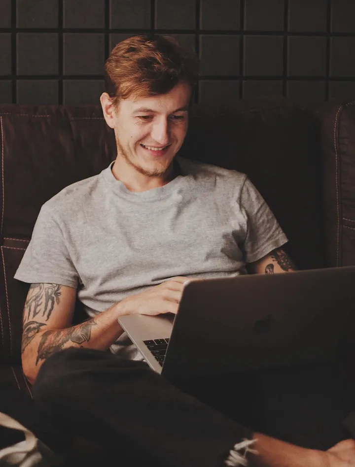 A person planning their week on a laptop