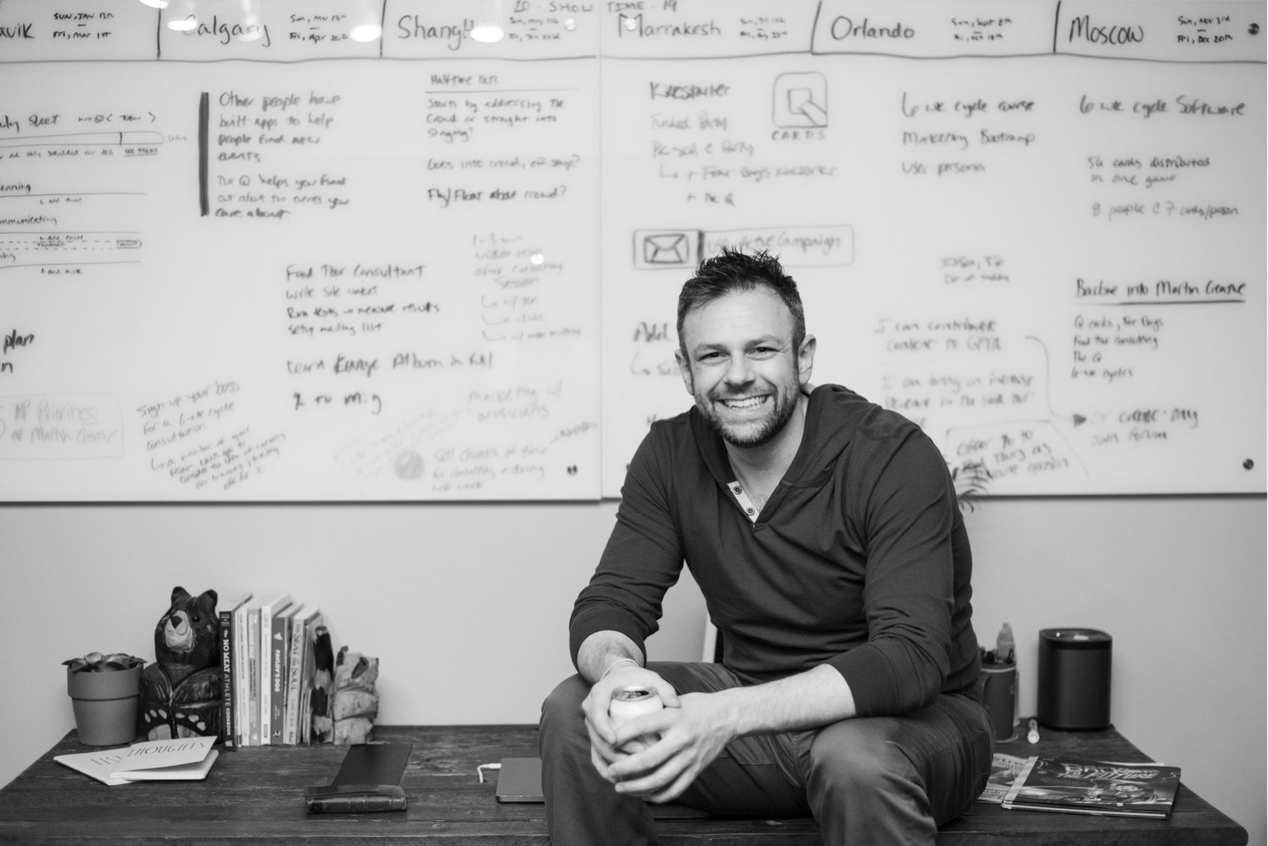 Joe Martin standing at a whiteboard covered in named six-week cycles